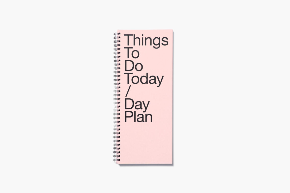 Spiral-bound pale pink to do planner with clean bold headings